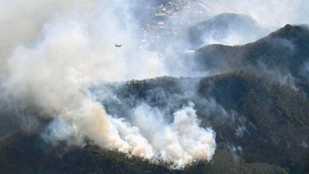 Helicopters, firefighters battle 2 forest fires in Japan Helicopters, firefighters battle 2 forest fires in Japan