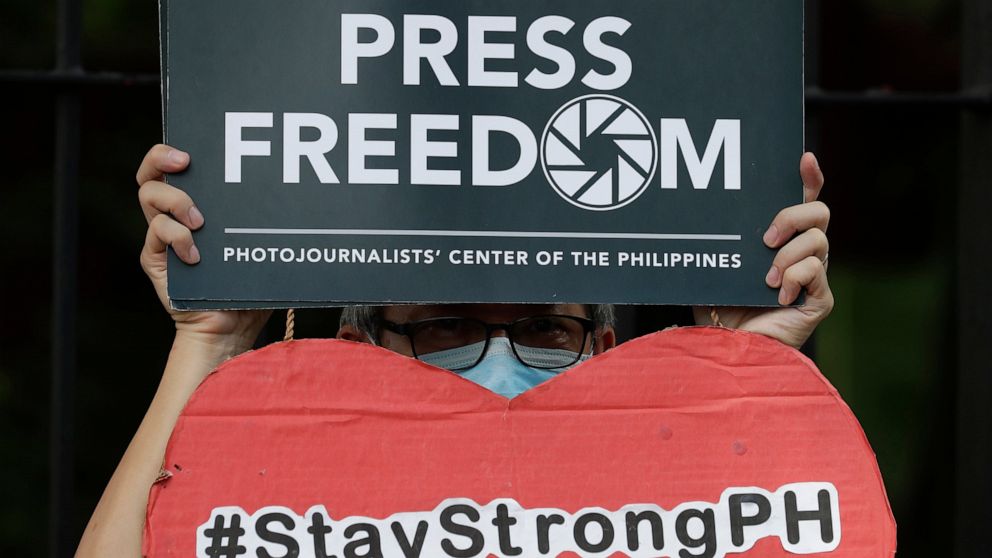 Filipino journalist shot dead while watching TV in store