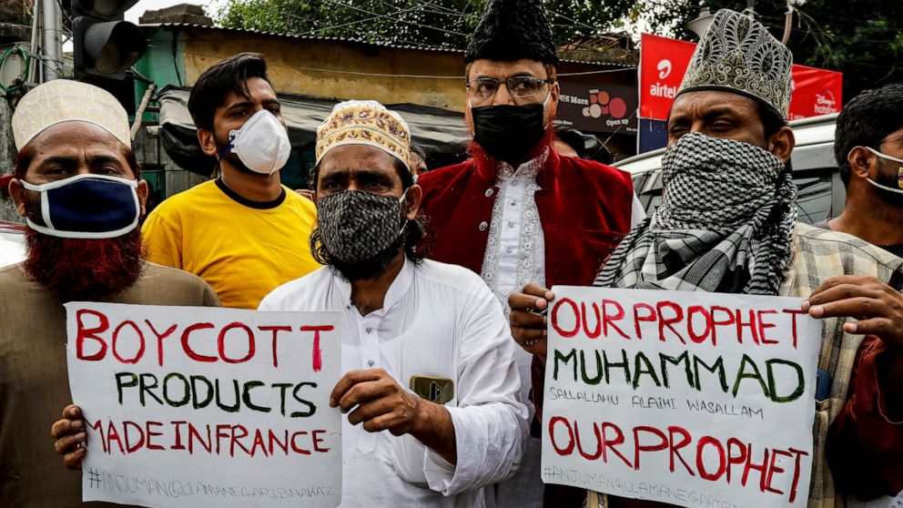 Muslim activists from various organizations participate in a protest against France, near the French Consulate, in Kolkata, India, Saturday, Oct. 31, 2020. Muslims have been calling for both protests and a boycott of French goods in response to Franc