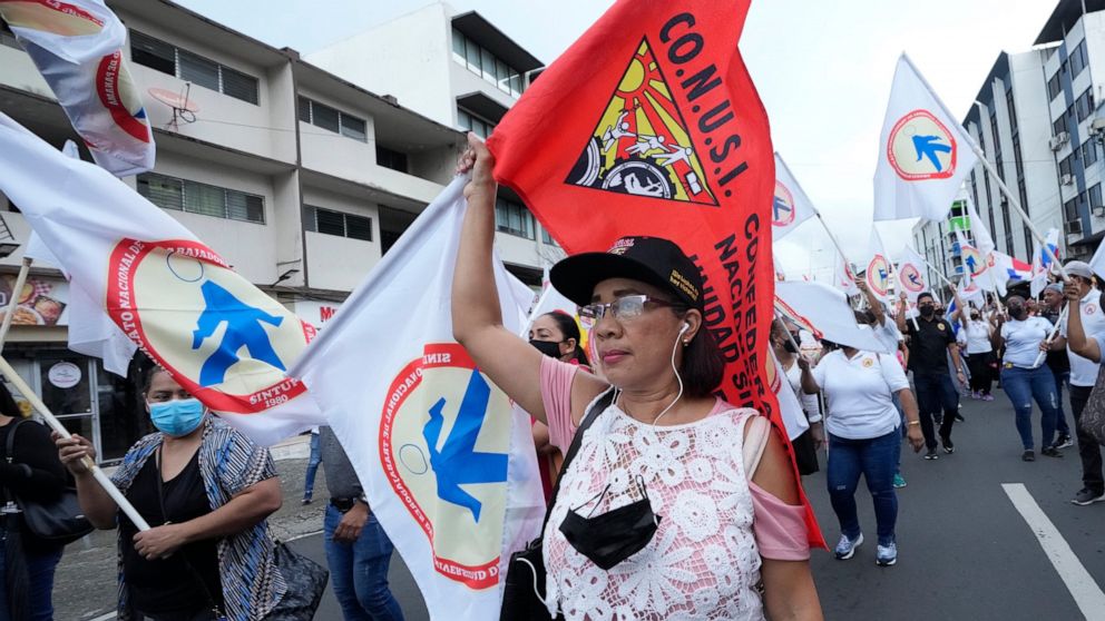 Unions march in support of striking teacher´s unions, toward the National Assembly in Panama City, Tuesday, July 12, 2022. Panamanians have taken to the streets in protest for more than a week, building upon anger over fuel prices that have nearly do
