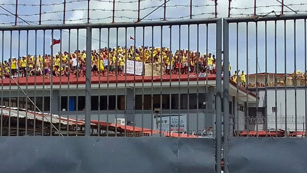 Philippines inmates protest on prison roof over food, warden