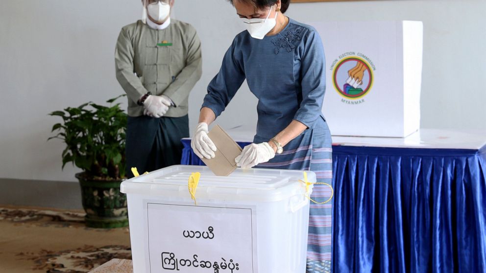 Myanmar's leader Aung San Suu Kyi makes an early voting for upcoming Nov. 8 general election at Union Election Commission office, Thursday, Oct. 29, 2020, in Naypyitaw, Myanmar. (AP Photo/Aung Shine Oo)