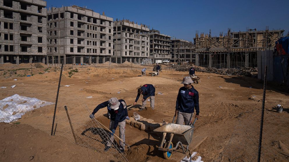 A Palestinian excavation team works in a newly discovered Roman era cemetery in the Gaza Strip, Sunday, Dec. 11, 2022. Hamas authorities in Gaza announced the discovery of over 60 tombs in the ancient burial site. Work crews have been excavating the 