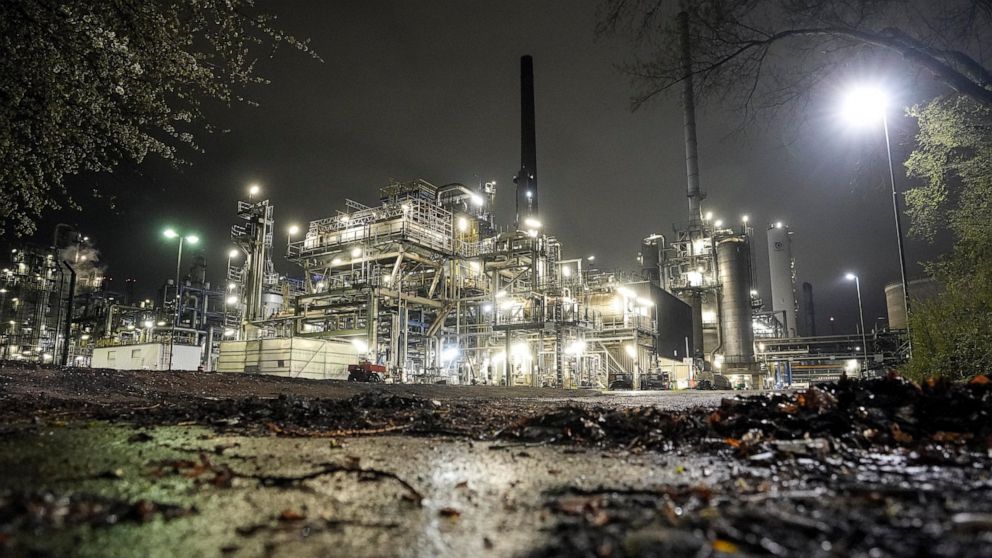 FILE - A refinery is illuminated in Gelsenkirchen, Germany, Tuesday evening, April 5, 2022. European governments were poised to ban on Russian coal imports despite the near-certainty of higher utility bills and inflation. But the limited energy sanct