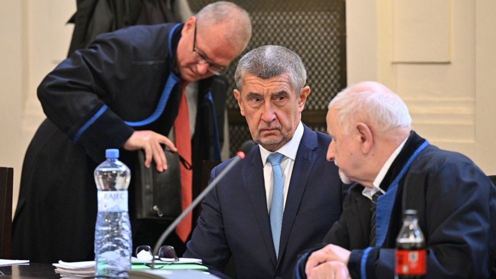 Former prime minister Andrej Babis, center, at the Prague Municipal Court in Prague. Czech Republic, Monday, Sept. 12, 2022. Babis goes on trial after the prosecution indicted him in a $2 million fraud case involving European Union subsidies. (Vit Si