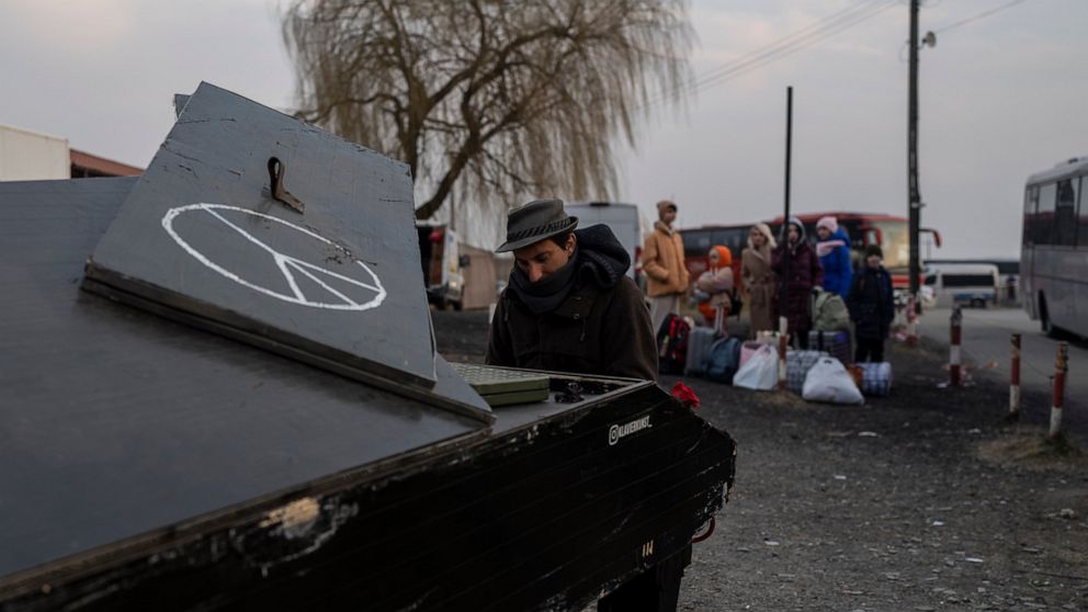 Rescuers search for survivors in smashed Mariupol theater