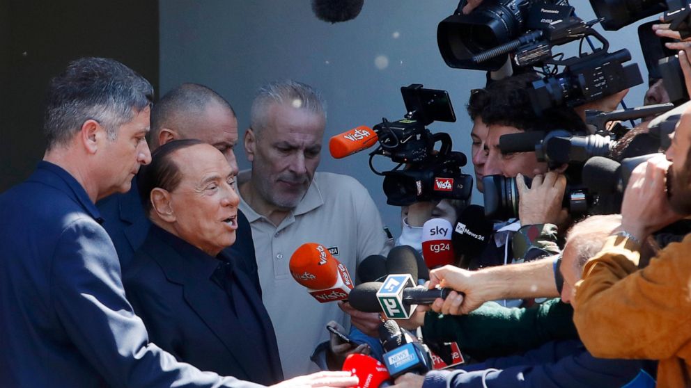 Former Italian Premier Silvio Berlusconi speaks to reporters as he leaves the San Raffaele hospital where he underwent laparoscopic surgery for an intestinal obstruction last week, in Milan, Italy, Monday, May 6, 2019. Berlusconi himself is running f