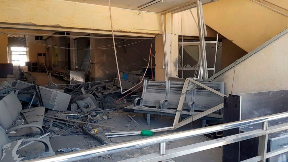 This photo released Sunday June 12, 2022 by the Syrian official news agency SANA, shows a damaged portion of the Damascus International Airport, which was hit by an Israeli airstrike on Friday, in Damascus, Syria. Syria's Transportation Ministry said