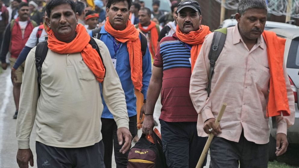 Hindu devotees leave for the Amarnath Yatra annual pilgrimage to to an icy Himalayan cave, in Nunwun, Pahalgam, south of Srinagar, Indian-controlled Kashmir, Thursday, June 30, 2022. Officials say pilgrims face heightened threat of attacks from rebel