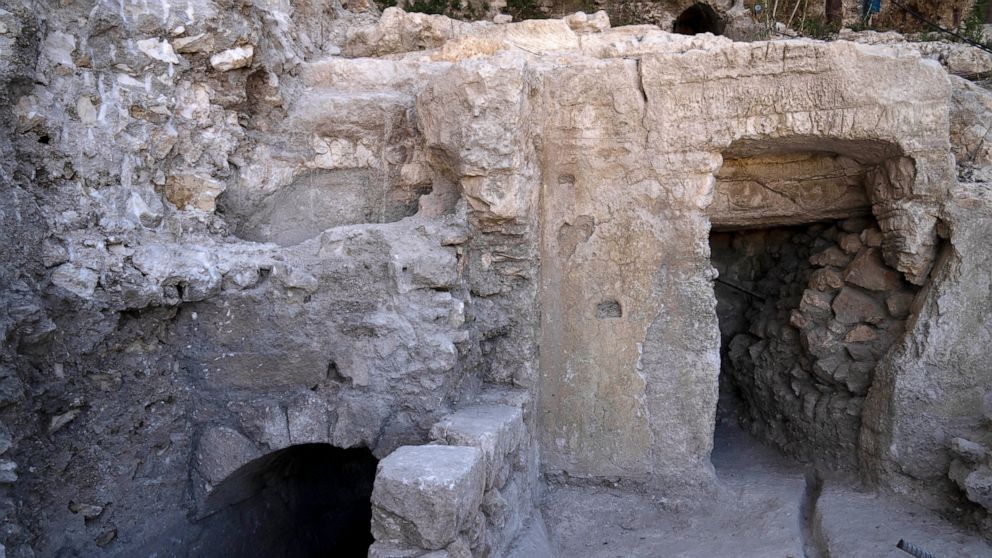The site of a Jewish ritual bath or mikveh, left, discovered near the Western Wall in the Old City of Jerusalem, Sunday, July 17, 2022. An excavation to build an accessible elevator from the Jewish Quarter to the Western Wall near the Temple Mount by