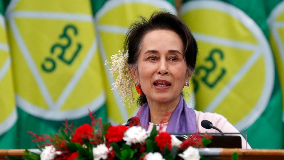 FILE - Myanmar's leader Aung San Suu Kyi delivers a speech during a meeting on implementation of Myanmar Education Development at the Myanmar International Convention Center in Naypyidaw, Myanmar, on Jan. 28, 2020. A court in Myanmar ruled Friday, Ju