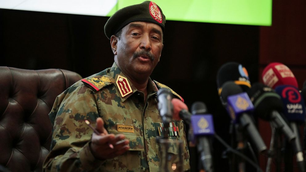 Sudan's head of the military, Gen. Abdel-Fattah Burhan,peaks during a press conference at the General Command of the Armed Forces in Khartoum, Sudan, Tuesday, Oct. 26, 2021. Burhan said that some members of the government he dissolved in a coup could