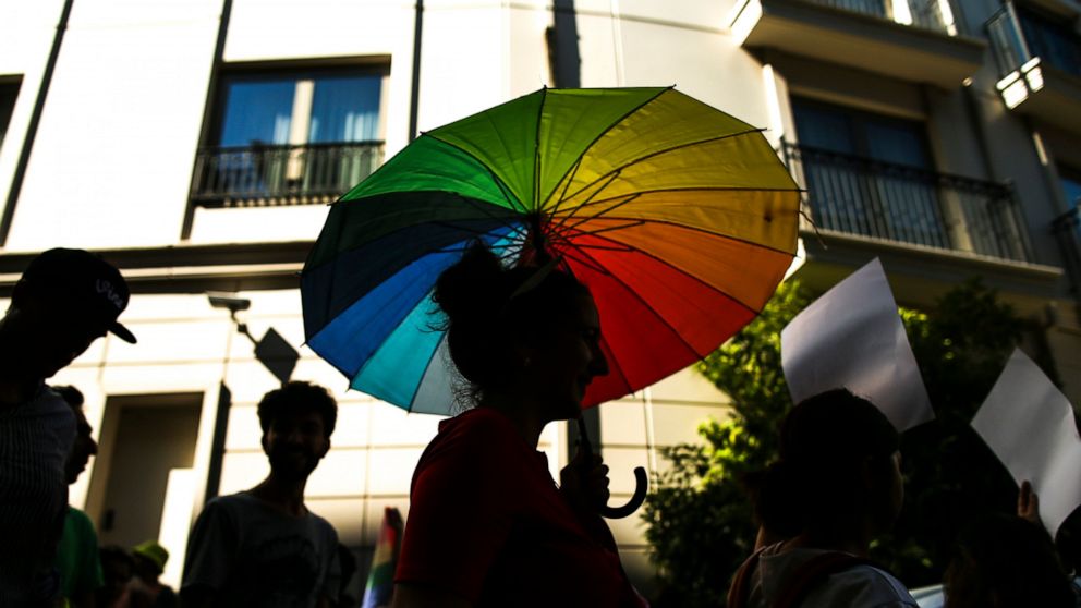 People march during the LGBTQ Pride March in Istanbul, Turkey, Sunday, June 26, 2022. Dozens of people were detained in central Istanbul Sunday after city authorities banned a LGBTQ Pride March, organisers said. (AP Photo/Emrah Gurel)