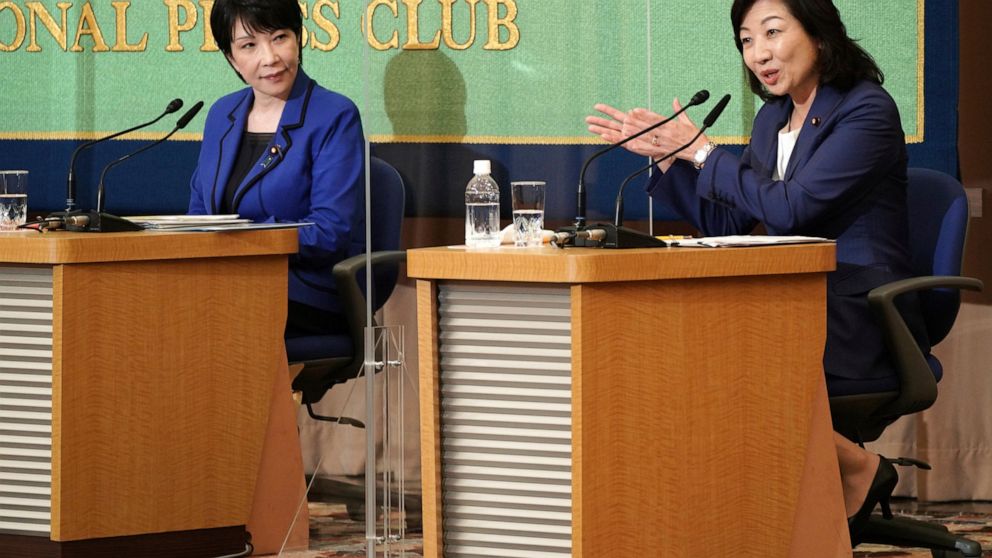 Sanae Takaichi, left, and Seiko Noda, right, both former internal affairs ministers and candidates for the presidential election of the ruling Liberal Democratic Party, attend a debate session held by Japan National Press club Saturday, Sept. 18, 202