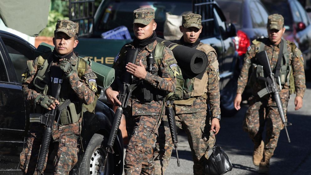 Soldiers arrive in Soyapango, El Salvador, Saturday, Dec. 3, 2022. The government of El Salvador sent 10,000 soldiers and police to seal off Soyapango, on the outskirts of the nation’s capital Saturday to search for gang members. (AP Photo/Salvador M