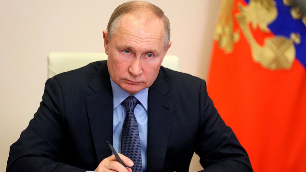 Putin rejects complaints over move to shut top rights group