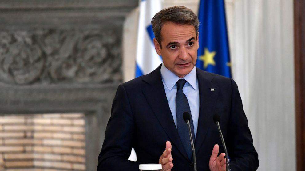 Greek Prime Minister Kyriakos Mitsotakis talks to the media during a press conference after a meeting with German Chancellor Olaf Scholz, at Maximos Mansion in Athens, Thursday, Oct. 27, 2022. Scholz is in Athens on a two-day official visit. (AP Phot