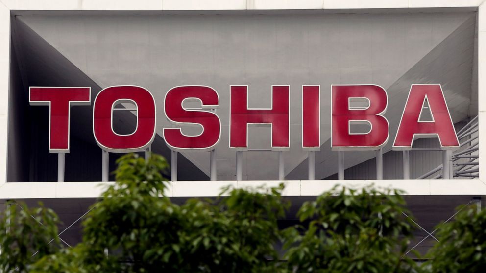 FILE - This May 26, 2017, file photo shows the company logo of Toshiba Corp. displayed in front of its headquarters in Tokyo. Toshiba Corp. has brushed off a new missive from CVC Partners about the global fund's interest in acquiring the Japanese man