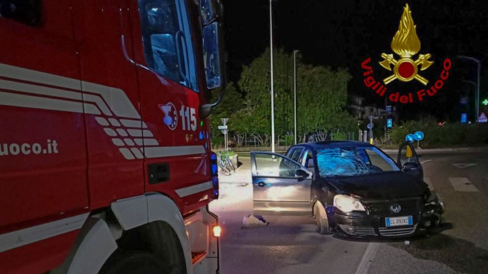 This picture released by the Italian firefighters on Monday, Aug. 22, 2022 shows the car driven by a U.S. servicewoman, which crashed into the curb at the edge of a roundabout about 2:30 a.m. Sunday in the town of Porcia, in northern Italy, causing t