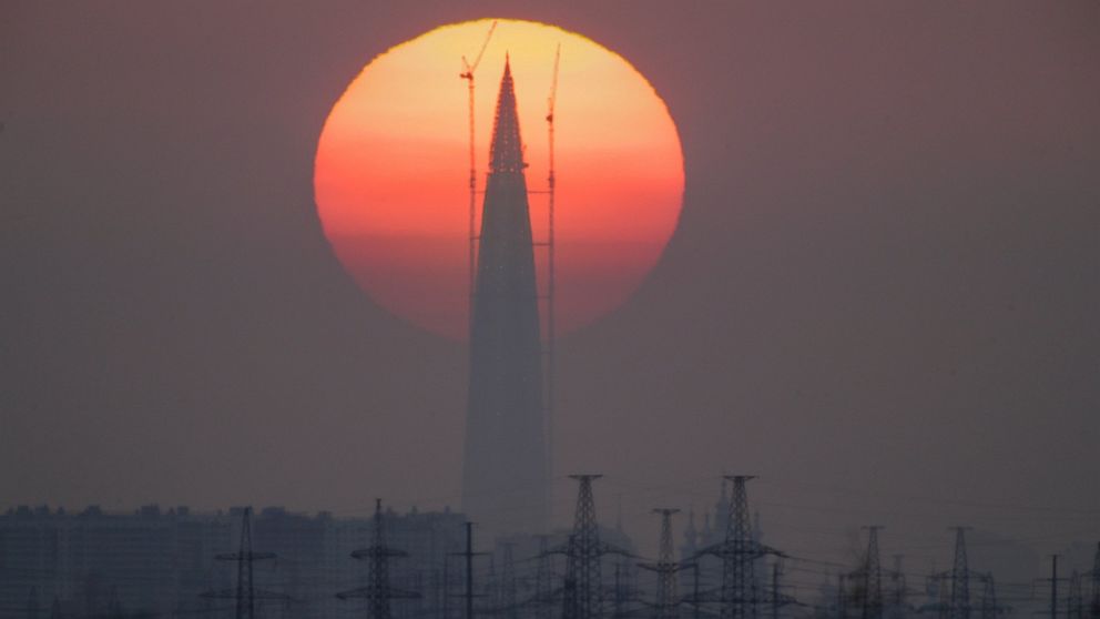 FILE - The Lakhta Centre tower under construction, the headquarters of Russian gas monopoly Gazprom, is silhouetted against the sunset in St. Petersburg, Russia, on April 15, 2018. Europe is short of gas. Russia could in theory supply more beyond its
