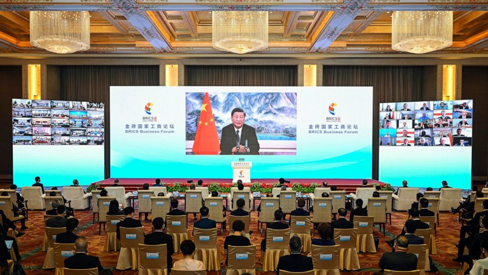 In this photo released by Xinhua News Agency, Chinese President Xi Jinping delivers a keynote speech in virtual format at the opening ceremony of the BRICS Business Forum on Wednesday, June 22, 2022. The conflict in Ukraine has "sounded an alarm for 