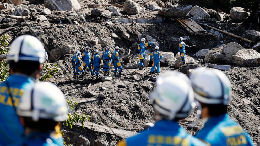 Rescuers search for missing persons at the site of a landslide triggered by Typhoon Hagibis, in Marumori town, Miyagi prefecture, Japan Wednesday, Oct. 16, 2019. The typhoon hit Japan's main island on Saturday with strong winds and historic rainfall 