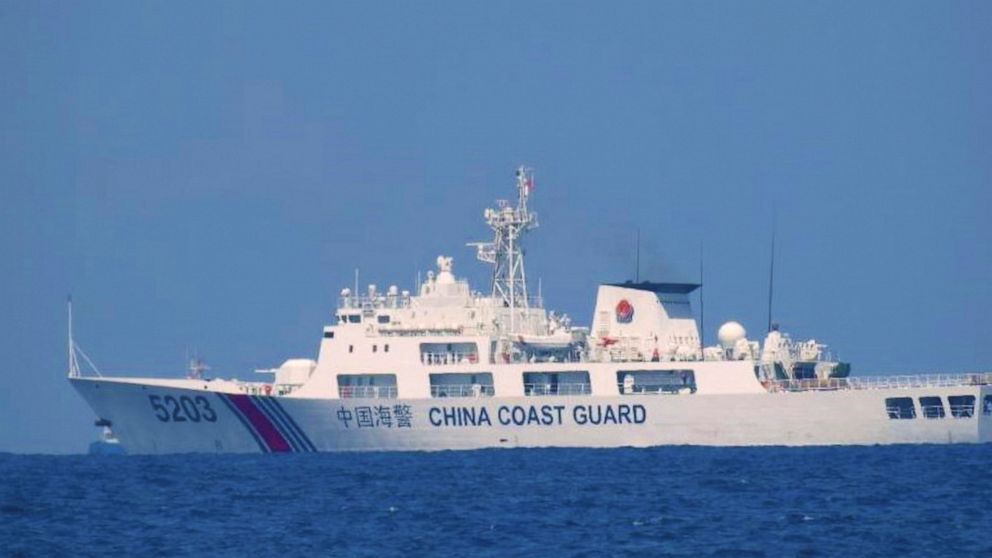China coast guard blocks Philippine boats in disputed sea