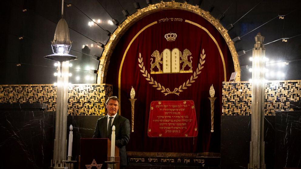 Rene de Reuver, speaking on behalf of the General Synod of the Protestant Church in the Netherlands, reads a statement at the Rav Aron Schuster Synagogue in Amsterdam, Netherlands, Sunday, Nov. 8, 2020.The Dutch Protestant Church made a far-reaching 