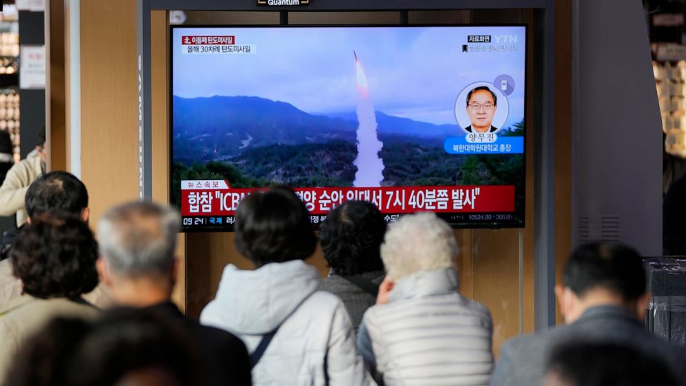 A TV screen showing a news program reporting about North Korea's missile launch with file footage is seen at the Seoul Railway Station in Seoul, South Korea, Thursday, Nov. 3, 2022. North Korea continued its barrage of weapons tests on Thursday, firi