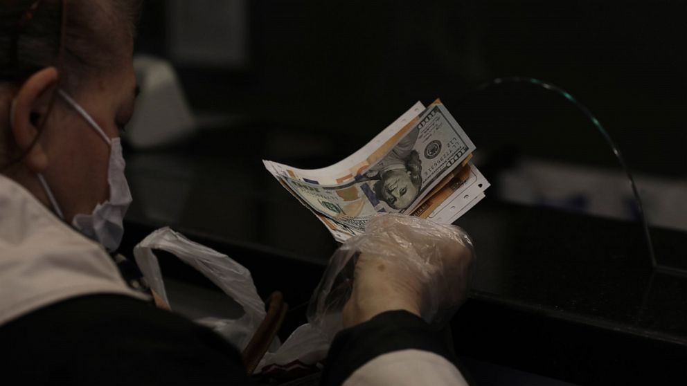 Erdogan replaces finance minister as Turkey's lira crashes