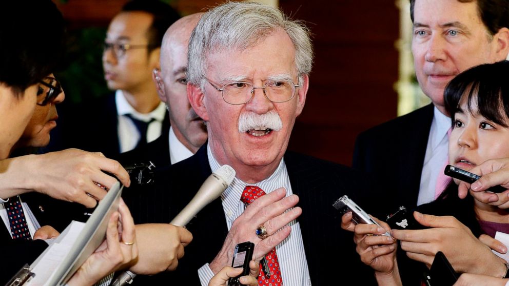 FILE - In this Friday, May 24, 2019, file photo, U.S. National Security Adviser John Bolton is surrounded by reporters at the prime minister's official residence in Tokyo, Japan. North Korea on Monday, May 27, 2019, has called U.S. National Security 