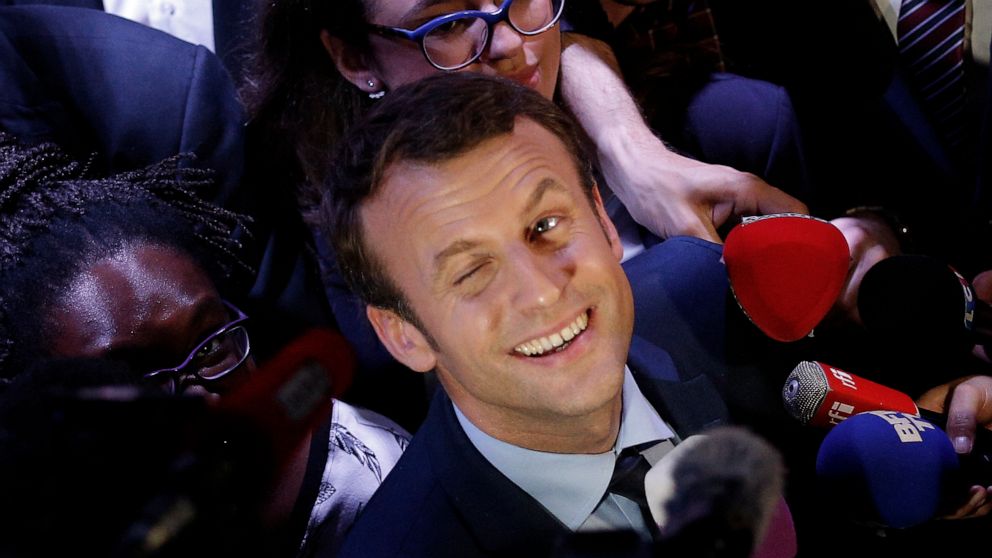 Macron, not candidate but already campaigning for reelection