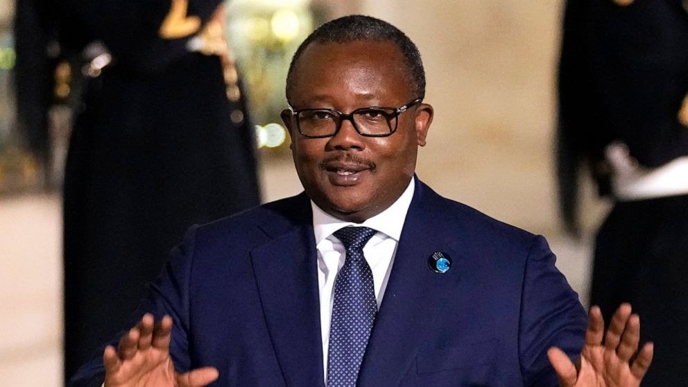 FILE - President of Guinea-Bissau Umaro Sissoco Embalo arrives for a dinner at the Elysee Palace as part of the Paris Peace Forum, in Paris, Nov. 11, 2021. Heavy gunfire erupted Tuesday Feb. 1, 2022 near the Government Palace in Guinea-Bissau's capit