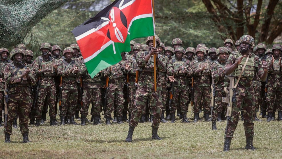 Members of the Kenya Defence Forces (KDF) take part in a flag-handover ceremony, ahead of a future deployment to eastern Congo as part of the newly-created East African Community Regional Force (EACRF), at the Embakasi garrison in Nairobi, Kenya Wedn