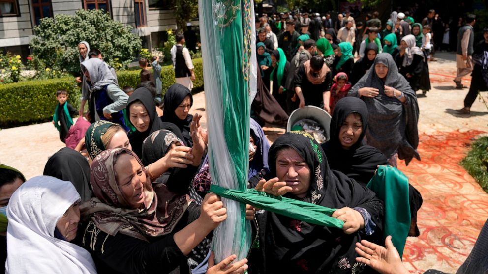 Afghan Shiite Muslim attend a mourning ceremony three days ahead of Ashoura to mark Ashoura, in a mosque in Kabul, Afghanistan, Friday, Aug. 5, 2022. Ashoura falls on the 10th day of Muharram, the first month of the Islamic calendar, when Shiites mar
