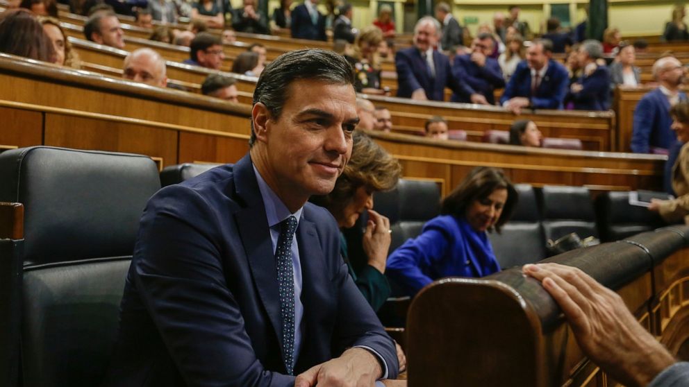 Spain's Caretaker Prime Minister Pedro Sanchez smiles, during the opening of the Spanish parliament in Madrid, Tuesday, Dec. 3, 2019. Deputies elected in Spain's November elections, the fourth in as many years, took their seats in the national parlia