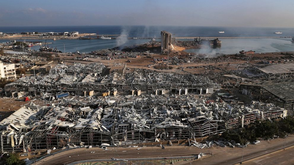 FILE - This Aug. 5, 2020 file photo, shows the scene of a deadly explosion that hit the seaport of Beirut, Lebanon. Abbas Mazloum, a Lebanese man who was critically injured in the massive explosion died Wednesday, Oct. 27, 2021, nearly 15 months afte