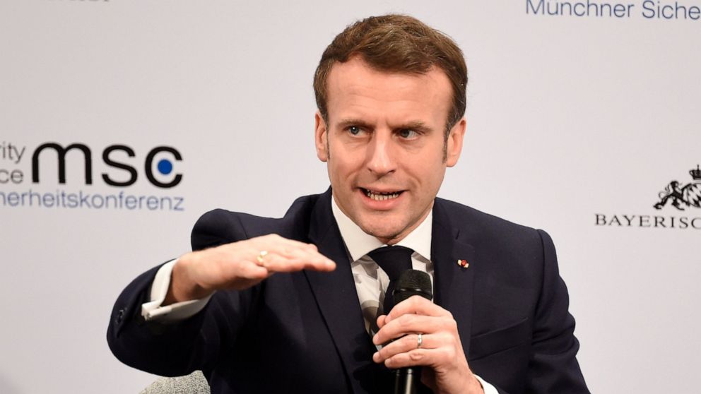 French President Emmanuel Macron gestures on the second day of the Munich Security Conference in Munich, Germany, Saturday, Feb. 15, 2020. (AP Photo/Jens Meyer)