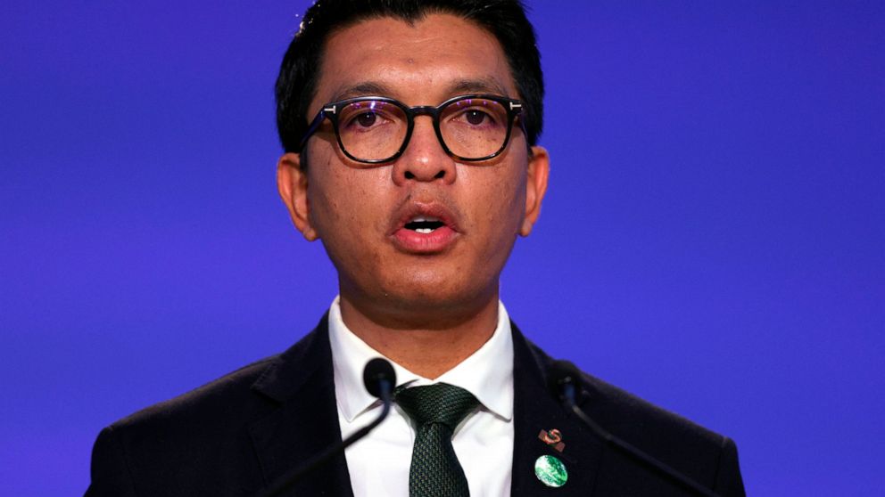 FILE — Madagascar's President Andry Rajoelina speaks during the UN Climate Change Conference COP26 in Glasgow, Scotland, Tuesday, Nov. 2, 2021. A court in Madagascar has convicted two French citizens of having plotted a failed coup against Rajoelina 