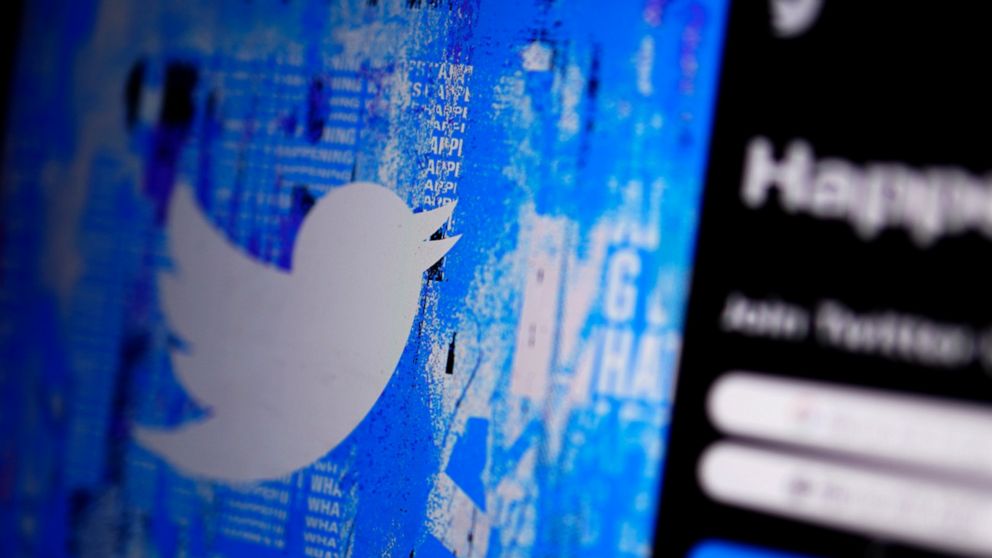 FILE - The Twitter splash page is seen on a digital device, Monday, April 25, 2022, in San Diego. Elon Musk’s more unfettered version of Twitter could collide with new rules in Europe. Officials warn the social media company will have to comply with 