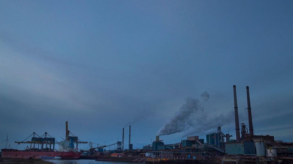 FILE - In this Tuesday Dec. 4, 2018, file photo, the Tata Steel factory is seen at dusk in IJmuiden, Netherlands. The future of steel production at the sprawling plant west of Amsterdam was called into question Thursday Sept. 2, 2021, after an invest