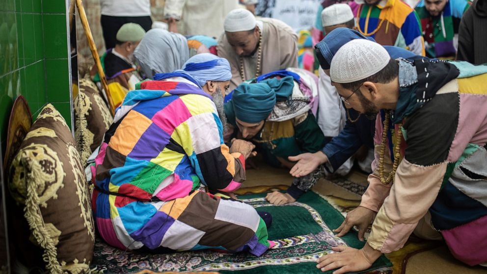 AP PHOTOS: Sufi religious order finally able to gather again