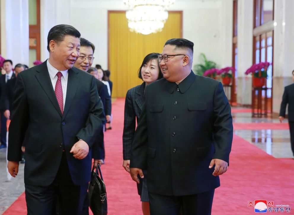 PHOTO: A photo released by the official North Korean Central News Agency shows North Korean leader Kim Jong-un, right, walking with Chinese President Xi Jinping during their meeting in Beijing, China, June 19, 2018.