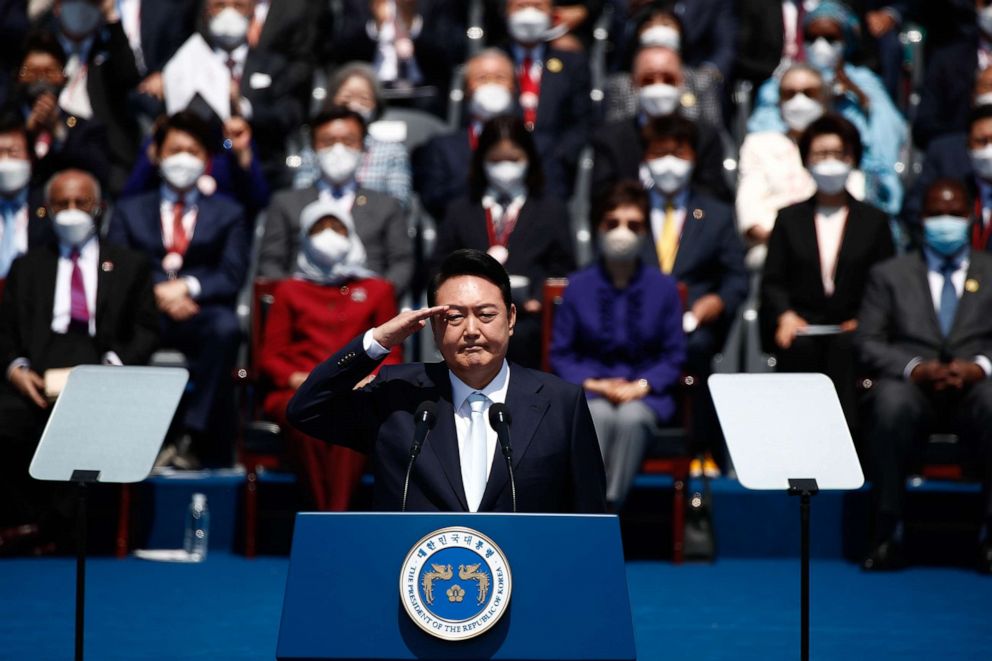 PHOTO: SEOUL, SOUTH KOREA - MAY 10: South Korean President Yoon Suk-yeol salutes during his inauguration at the National Assembly on May 10, 2022 in Seoul, South Korea. 