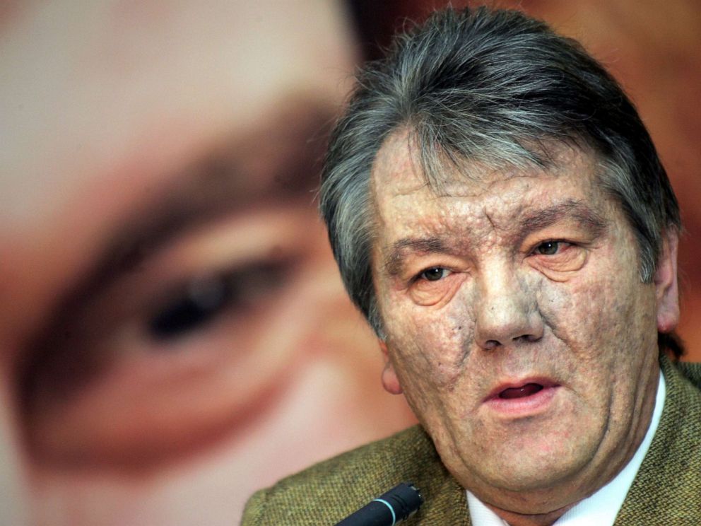 PHOTO:Pro-West opposition leader Viktor Yushchenko gestures under his own portrait during a press conference in Kyiv, Ukraine, Dec. 10, 2004. 