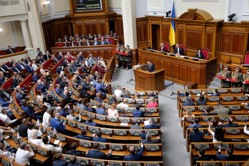 PHOTO: Ukrainian new President Volodymyr Zelenskiy, background center, speaks to the parliament during his inauguration ceremony in Kiev, Ukraine, May 20, 2019.