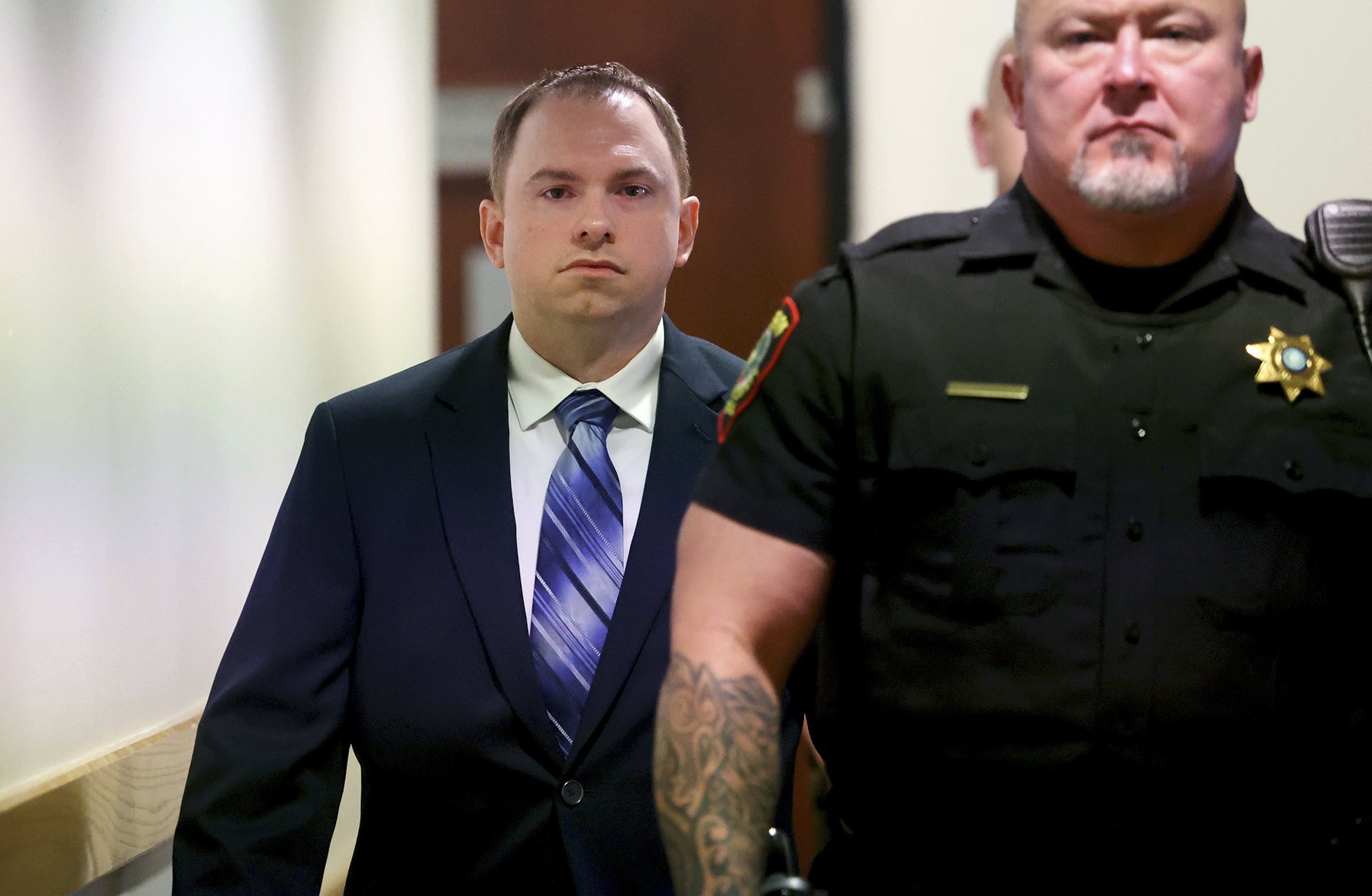 PHOTO: Aaron Dean arrives at the 396th District Court in Fort Worth on Dec. 5, 2022, in Fort Worth, Texas, for the first day of his trial in the murder of Atatiana Jefferson.