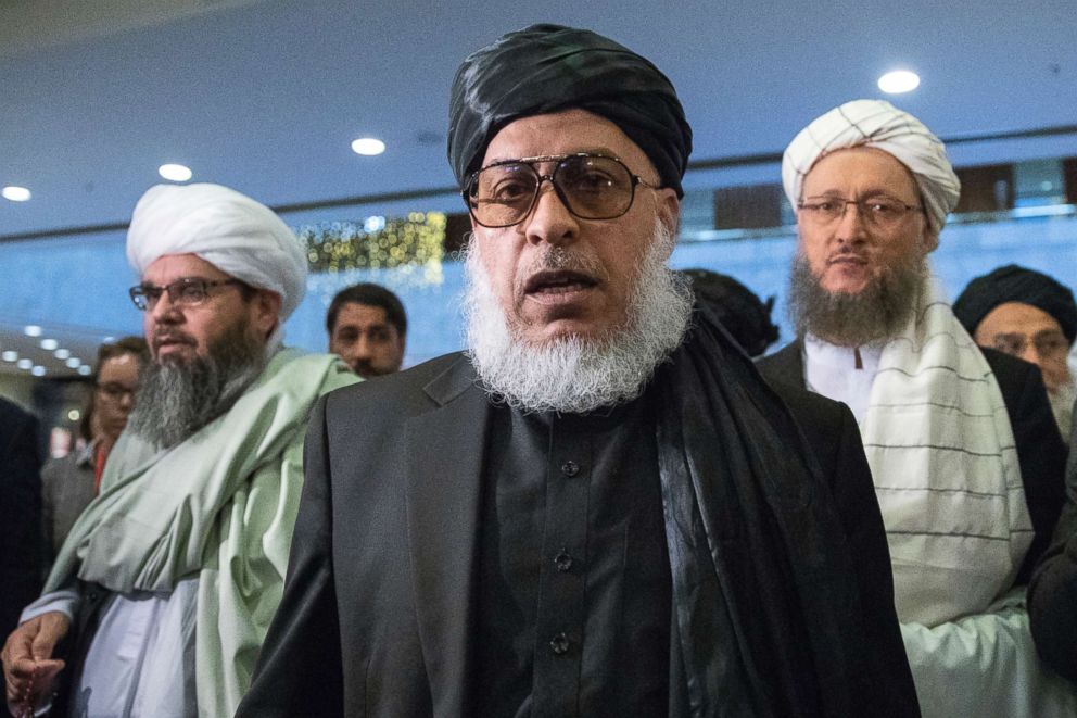 PHOTO: Taliban political chief Sher Mohammad Abbas Stanikzai, center, walks in a hall as he attends the "intra-Afghan" talks in Moscow, Feb. 6, 2019. 