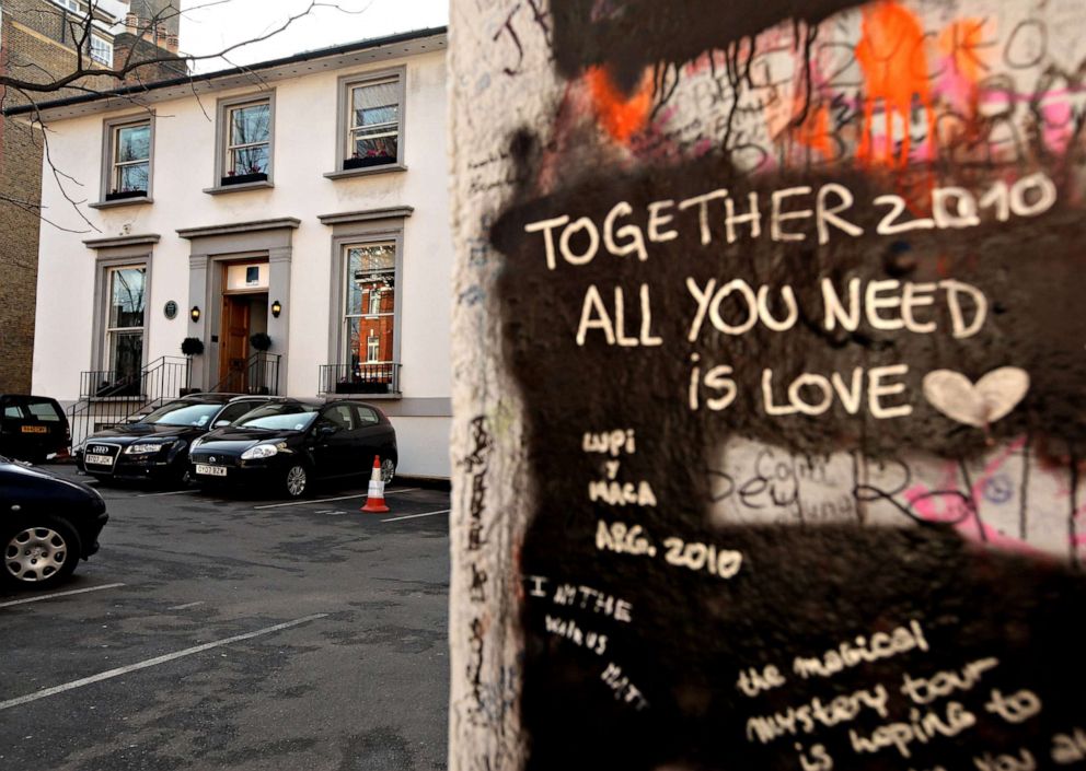 PHOTO: Graffiti tributes cover the entrance to the Abbey Road recording studios, which was put up for sale by their owner EMI on Feb. 17, 2010, in London.
