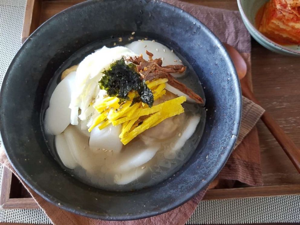 Rice cake soup is traditionally eaten by South Koreans during the Lunar New Year.